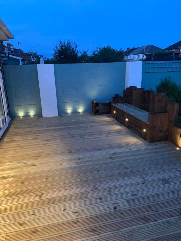 Decking with recessed uplighting at dusk